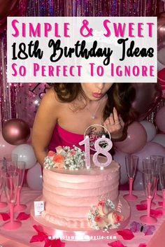 a woman is blowing out the candles on her birthday cake