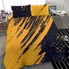 a bed with yellow and black paint splattered on it