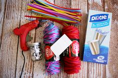 the supplies needed to make this craft include yarn, glue, scissors and other items