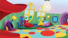 this is a children's playroom with lots of colorful furniture and decorations on the walls