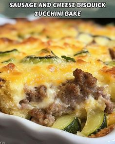 sausage and cheese biscuit zucchini bake in a white casserole dish