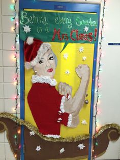 a bulletin board with an image of a woman in santa's hat on it