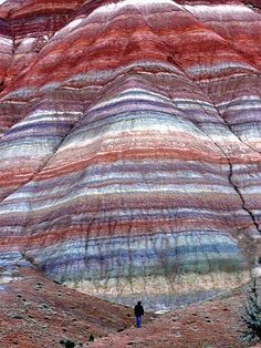 colorful rock formations in the desert with no people