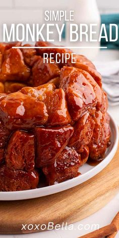 a monkey bread recipe on a plate with cinnamon sticks