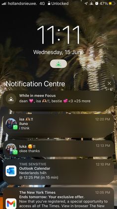 an iphone screen showing notifications for the upcoming event, with palm trees in the background