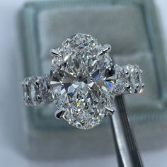 a diamond ring with three stones on it