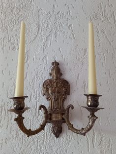 This stunning silver-plated brass candle holder is beautifully ornate and heavy, designed to hold taper candles. It is in very good condition, adding a touch of elegance to any space. Dimensions:     Height: 27 cm     Width: 28 cm     Depth: 13 cm A perfect statement piece for your home décor! Vintage Wall Candle Holders, Hip Jewelry, Wall Mounted Candle Holders, Wall Candle, Vintage Wall Sconces, Romantic Bedroom, Wall Candle Holders, Brass Candle Holders, Candle Wall Sconces