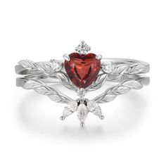 Radiating warmth and love is our Flaming Heart Red Garnet Ring Set© that unveils a heart-shaped red garnet gem at the center of a silver leaf patterned band with a matching topaz stacking ring to add a perfect splendor. A glimmering set that serves as a beautiful reminder to know your worth, spread love, and make a difference. It is also a perfect and timeless symbol of love with a promise to stay forever. ✦ Available in both 14K white gold vermeil (14K white gold plated over a sterling silver b Dnd Wedding, Bff Rings, Flaming Heart, Red Garnet Ring, Stay Forever, Know Your Worth, Timeless Symbol, Garnet Gem, Heart Red