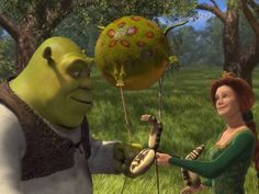 an animated character is handing something to a woman in a green dress and holding a yellow balloon