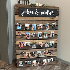 a wooden pallet with photos hanging on it