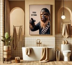 a bathroom with a star wars poster on the wall