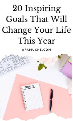 a notepad, keyboard and pen on top of a desk with the words 20 inspirational goals that will change your life this year