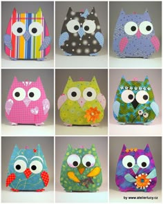 nine different colored owls with big eyes and flowers on their heads, all made out of paper