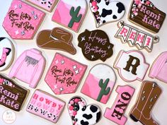 decorated cookies are arranged in the shape of cowgirls and cowboy's hats