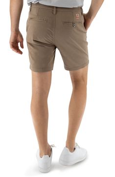 Designed for all-day comfort, these straight-leg chino shorts are made from performance-stretch sateen twill with a key loop in front and a logo patch in back. The pocket liners are made with recycled REPREVE® yarns. 7" inseam; 10 1/2" front rise Zip fly with button closure Front slant pockets; front coin pocket; back welt pockets 98% cotton, 2% spandex Machine wash, tumble dry Imported Solid Cotton 4-way Stretch Shorts, Cotton 4-way Stretch Shorts, 4-way Stretch Cotton Shorts, 4-way Stretch Cotton Short Bottoms, Casual Chino Cotton Twill Shorts, Devil Dogs, Stretch Chinos, Dark Beige, Dungarees