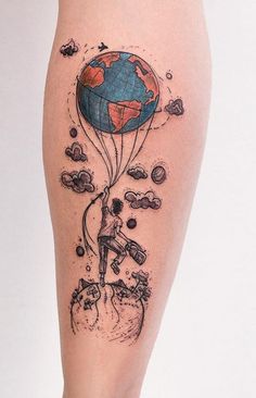 a woman's leg with a tattoo on it and an image of a person holding a balloon