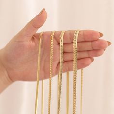 "The 14k Gold Herringbone Chain Necklace exudes sleek elegance. This lovely necklace comes in a range of sizes, including 3.2mm, 4mm, 4.2mm, and 5.2mm, so you can find the appropriate thickness for your style and preferences. This necklace, made with painstaking attention to detail, highlights the elegance of the herringbone chain, which is noted for its flat and detailed woven design. Its simplistic and adaptable design makes it suitable for stacking with other necklaces or wearing as a standout item on its own. Made from high-quality 14k gold, this necklace exudes elegance and sophistication. Its timeless style makes it appropriate for any situation, making it a treasured addition to your jewelry collection or the ideal anniversary gift. With the 14k Gold Herringbone Chain Necklace, you Minimalist Herringbone Necklace With Figaro Chain As Gift, Flat Chain Necklace, Gold Herringbone Chain, Herringbone Chain Necklace, Necklace Minimalist Jewelry, Herringbone Chain, Jewellery Marketing, Necklace Minimalist, Woven Design