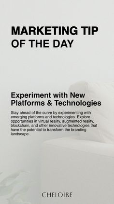 a white couch sitting next to a plant in front of a wall with the words marketing tip