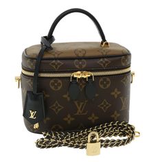 LOUIS VUITTON Monogram Reverse Vanity NVPM Hand Bag 2way M45165 LV Auth 32450A   ITEM DESCRIPTION BRAND LOUIS VUITTON Color Monogram Reverse Material Monogram Reverse Canvas Size(cm) W19cm x H13cm x D11cm(Approx) Size(Inch) W7.5 x H5.1 x D4.3inch(Approx) Style Hand Bag Accessory Dust Bag / Item Box / Padlock / Key x2 / Shoulder Strap Product No. M45165 Made in France Serial No. RFID(E0:16:3C:01:54:4F:D9:8D) Rank S Condition Outside Surface：It is in excellent condition without any remarkable scratches. Inside It is in excellent condition without any remarkable scratches. Pocket It is in excellent condition without any remarkable scratches. Corner It is in excellent condition without any remarkable scratches. Odor No offensive odor to us. RANK RANK Items with the grading S or SA are as close Prada Jewelry, Reverse Canvas, Vanity Bag, Hand Bag, Canvas Size, Backpack Bags, Louis Vuitton Bag, Louis Vuitton Monogram, Bags Handbags