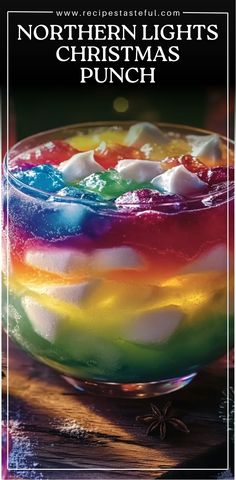 the northern lights christmas punch recipe in a glass bowl on a wooden table with text overlay