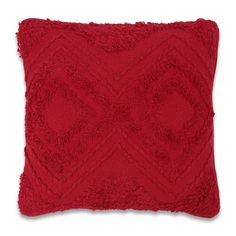 a red pillow on a white background