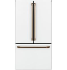 a white refrigerator freezer with copper handles