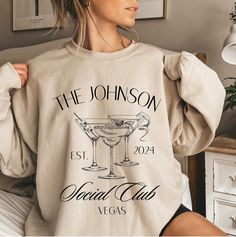 Set the tone for a sophisticated bridal party with our 'Custom Social Club' sweatshirts, customizable with your name, your location and the special date. Perfect for bridesmaid proposals or as a cherished gift, these classy crewnecks add a touch of exclusivity to your bridal crew's attire for pre-wedding gatherings and beyond. ♥PRODUCTION TIME: 1-5 days (usually 2-3 days) ♥SHIPPING TIME: 2-5 days (usually 3 days) 🎁 LAST DAYS FOR CHRISTMAS DELIVERY 🎁 USA - 12/12/2023 ♥PRODUCT DESCRIPTION: Gildan Crewneck Unisex Sweatshirt Super soft cotton and excellent quality print makes. 50% cotton and 50% polyester (fiber content may vary for different colors) Medium-heavy fabric (8.0 oz/yd² (271.25 g/m²) Runs true to size Our Relaxed Fit Sweatshirt (Gildan 18000) is a unisex style that runs a touch s Luxury Bachelorette Party, Club Bachelorette, Luxury Bachelorette, Bachelorette Party Shirt, Cocktail Club, Etsy Wedding Favors, Club Sweatshirts, Bridal Party Shirts, Bachelorette Party Shirts