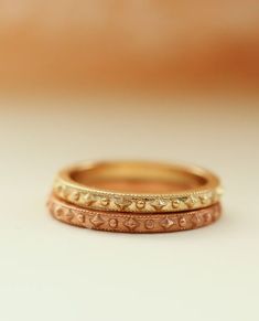 Cherished Gold Ring
With a delicate confetti beaded pattern surrounding the entire band, she's a reminder you're cherished. You cherish those you love most.  Beautiful crafted stacking ring perfectly pairs with other Erin Pelicano rings, or as a band worn in her own beauty. Stack one for each child, stack one for each of your favorite people, collect one for each milestone, or wear as your wedding band.

Designed and crafted in solid 14k gold, choose from white, yellow, or rose gold.

 	14k Handmade 14k Gold Stackable Promise Rings, Heirloom Stackable Diamond Cut Rings, Stackable Bands As Gift, Heirloom Style Stackable Eternity Band, Heirloom Style Stackable Round Eternity Band, Heirloom Stackable Round Eternity Band, Heirloom Stackable Midi Rings, Heirloom Style Stackable Diamond Cut Rings For Promise, Heirloom 14k Gold Stackable Promise Rings