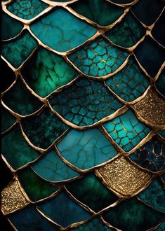 a close up view of some kind of glass with gold and blue colors on it