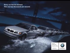 an advertisement for the bmw brand featuring five cars driving in front of a bridge at night