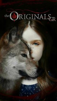 a girl with long hair and blue eyes is next to a wolf