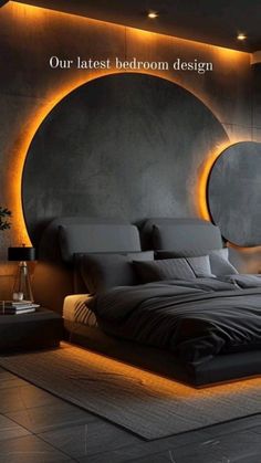 a large bed sitting in a bedroom next to a wall with lights on it's sides