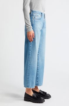 Casual-chic and right on trend, these ankle-cropped wide-leg jeans are made from light-wash nonstretch denim to further the vintage vibe. 27" inseam; 22" leg opening; 11" front rise; 14" back rise (size 29) Zip fly with button closure Five-pocket style 100% cotton Machine wash, tumble dry Imported Light Wash Wide Leg Cropped Jeans For Fall, Fall Light Wash Wide Leg Cropped Jeans, Relaxed Fit Light Wash Cropped Flare Jeans, Relaxed Fit Cropped Light Wash Flare Jeans, Relaxed Fit Cropped Flare Jeans In Light Wash, Light Wash Wide Leg Cropped Jeans With Frayed Hem, Chic Light Wash Relaxed Fit Cropped Jeans, Light Wash Cropped Flare Jeans With Relaxed Fit, Cropped Wide Leg Jeans