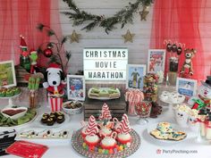 a christmas movie themed dessert table at a party