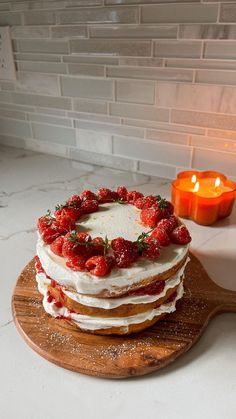 a cake sitting on top of a wooden cutting board