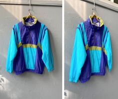 "Vintage 90s Neon Anorak Purple Blue Sports Jacket Colorblock Pullover Jacket Purple Windbreaker Purple Anorak Windbreaker Mens M Windbreaker D E S C R I P T I O N: 💜light to medium weight 💜2 pockets 💜striped Brand: not labeled Suggested size: M, to ensure a good fit, please check the below measurements carefully. Material: polyamide, cotton Condition: very good vintage - minor general signs of wear and age, no obvious flaws. 🧵 M E A S U R E M E N T S 💜Measurements - taken from seam to seam Blue Retro Windbreaker For Outdoor Activities, Blue Color Block Windbreaker For Outdoor, Blue Half-zip Windbreaker For Sports, 90s Patchwork Windbreaker For Outdoor, 90s Style Patchwork Windbreaker For Outdoor, 90s Color Block Windbreaker For Outdoor, Retro Blue Color Block Windbreaker, Blue Sports Jacket, Southwestern Jacket