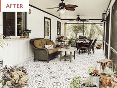 a living room filled with furniture and lots of plants on top of the floor next to a table