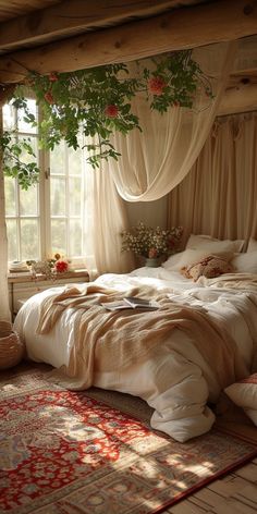 a large bed sitting in a bedroom next to a window with curtains and flowers on it