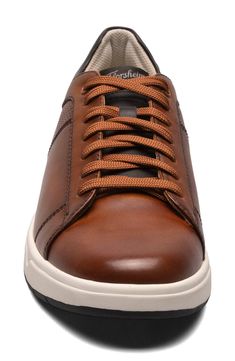 This lace-up style merges the comfort of a sneaker with boardroom-ready polish for a footwear option that takes you from 9 to 5 and beyond. Removable OrthoLite® insole Leather upper/textile lining/rubber sole Imported Brown Formal Sneakers With Cushioned Footbed, Brown Slip-resistant Plain Toe Sneakers, Slip-resistant Tpr Plain Toe Sneakers, Brown Leather Slip-resistant Sneakers, Slip-resistant Tpr Sneakers With Plain Toe, Brown Low-top Slip-resistant Sneakers, Stylish Low-top Sneakers With Ortholite Insole, Brown Wingtip Sneakers With Removable Insole, Brown Cushioned Sneakers With Plain Toe