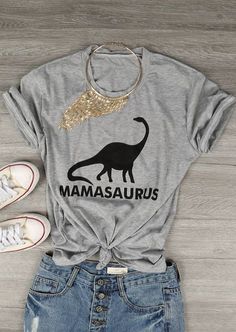 a grey shirt with gold sequins on it and a t - shirt that says ma