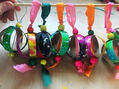 a group of bracelets hanging from a string