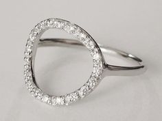 Modern Diamond Crystal Ring, Modern Everyday Crystal Ring, Modern Silver Diamond Ring For Everyday, Modern Diamond Ring With Halo Design, Modern Open Circle Jewelry With Ring Detail, Minimalist Cubic Zirconia Crystal Ring, Modern Circular Jewelry With Ring Detail, Silver Crystal Ring For Everyday Modern Style, Silver Crystal Ring For Everyday Wear