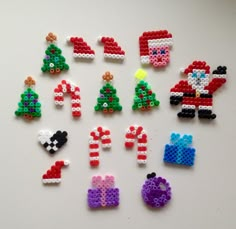 the beads have been made to look like christmas trees and santas are in different colors