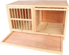 a small wooden bird cage with doors open