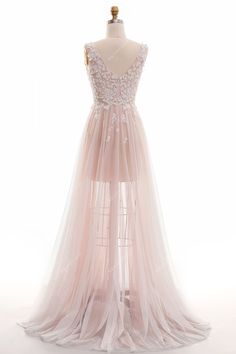 a dress on a mannequin with sheer tulle