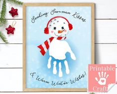 a christmas card with a snowman on it and handprints in the background