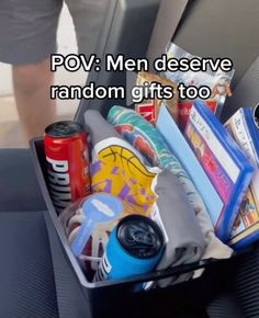 a car seat filled with lots of items and the words pov men deserves random gifts too