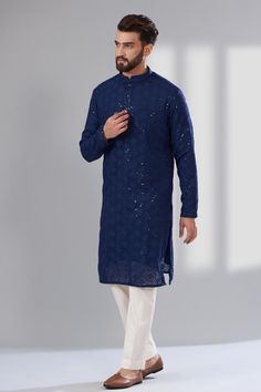 Navy blue kurta with intricate chikankari floral patterns and sequin work embroidery. Comes with a pant. - Aza Fashions Sequin Work Embroidery, Floral Kurta For Men, Navy Blue Kurta, Blue Kurta, Kurta Set For Men, Luxury Sale, Kurta Set