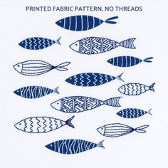 a blue and white fish pattern is shown on a napkin with the words printed fabric, no threads