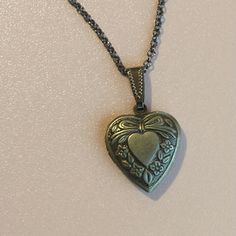 These engraved heart shaped lockets can ship tomorrow. The antique silver lockets can open and close (they are photo ready lockets.) If you like dark silver jewelry, this might just be your locket.  Each locket comes on a 15 inch silver-ox chain with a matching 3 inch (7.5 mm) chain extender.  Like everything else here in HollysPrivateIdaho, they were made with love in a smoke-free home. Silver Locket Aesthetic, Dark Silver Jewelry, Cottage Core Jewelry, Heart Shaped Locket, Accessory Inspo, Antique Locket, Silver Locket, Vintage Lockets, Saratoga Springs